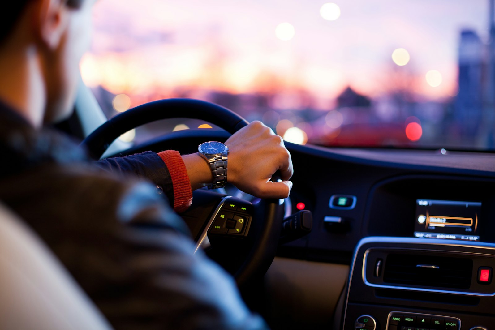 Driver behind the wheel of their car